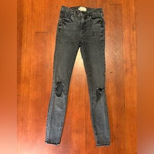 Free people black stretch skinny jeans 24